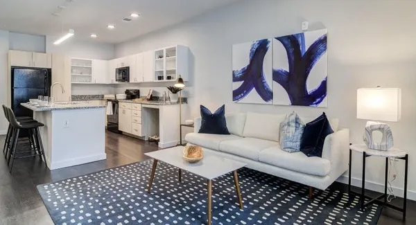 a living room with a couch and a flat screen tv