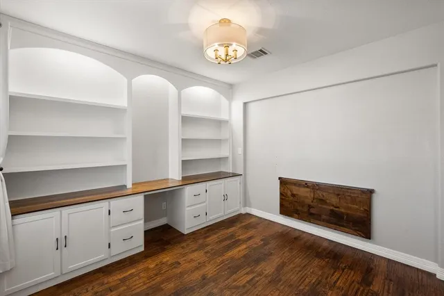 a view of livingroom with hardwood floor and a ceiling fan
