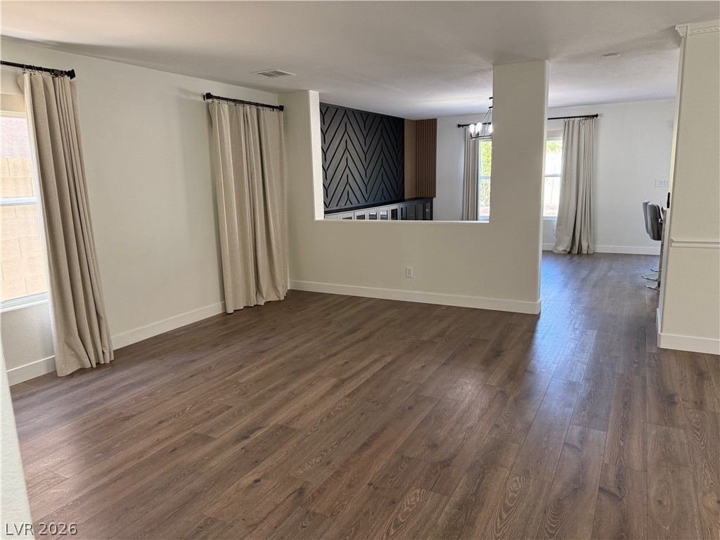 1141 Cathedral Ridge Street Henderson, NV 89052 - Photo 8 of 77 This airy space features durable flooring and an open-concept design, ideal for adaptable living.