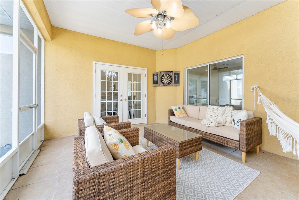 4987 Southwest 63rd Loop Ocala, FL 34474 - Photo 51 of 56 a living room with furniture and a large window