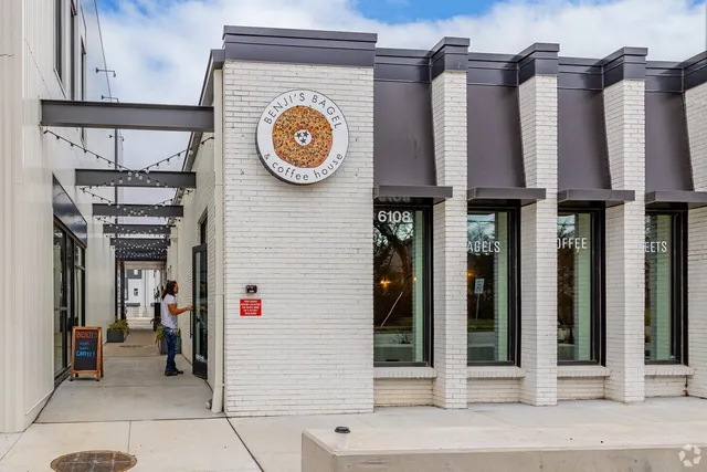 a view of a house with a small yard