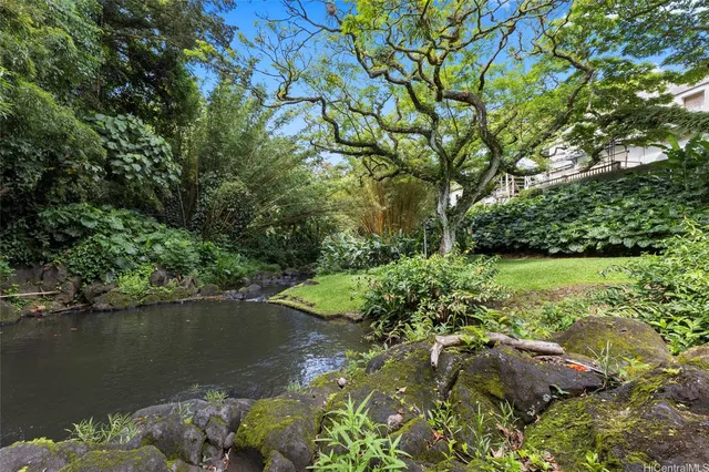 a view of lake with green space