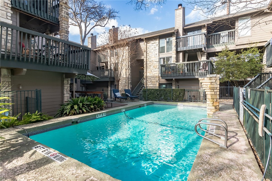 3627 Menchaca Road, Unit 112 Austin, TX 78704 - Photo 19 of 25 You will be next to the Community Pool. The 1st story exterior wall of #112 is in the left background.