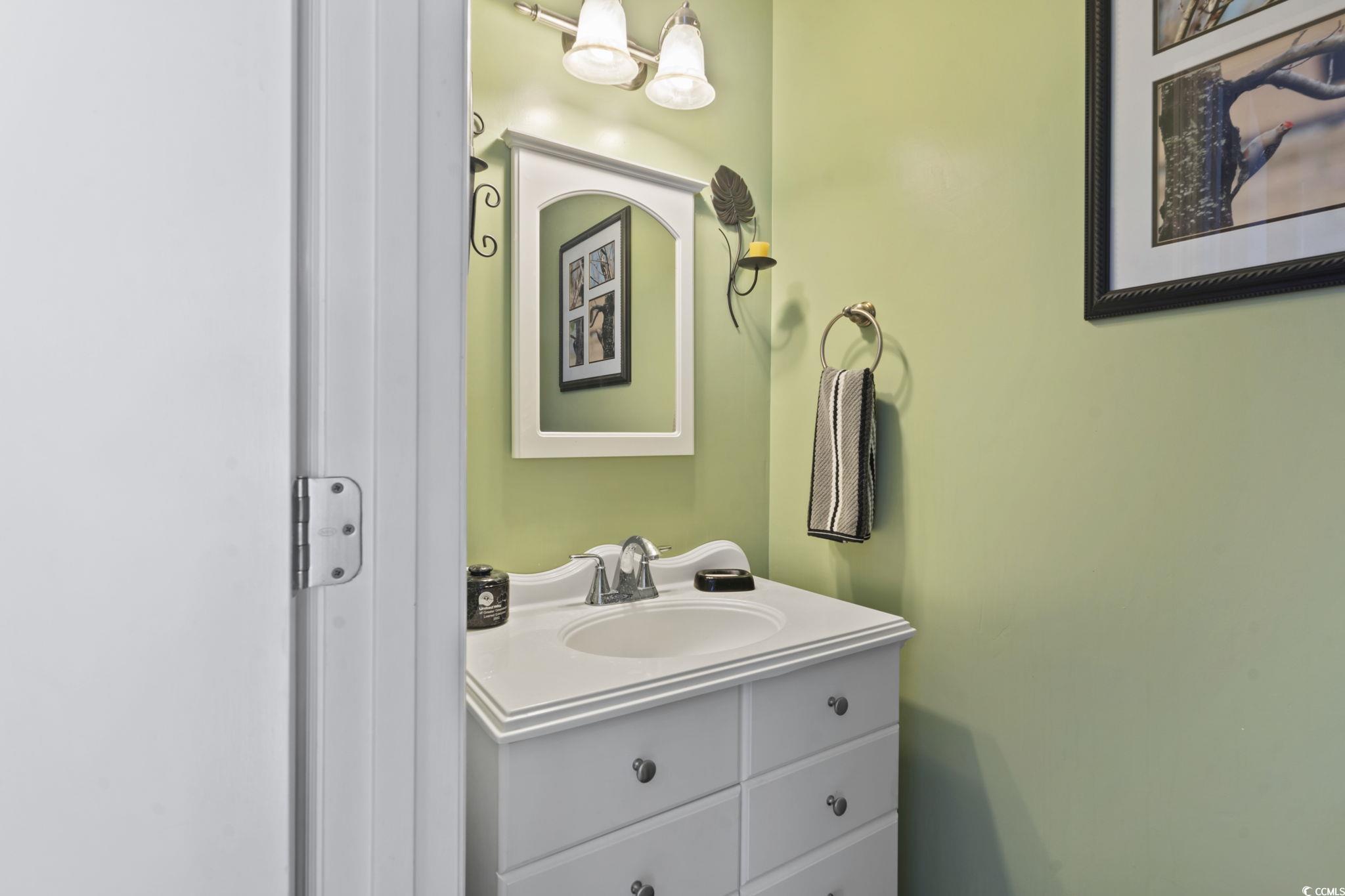 55 Beaver Pond Loop, Unit 15 Pawleys Island, SC 29585 - Photo 19 of 24 Bathroom featuring vanity