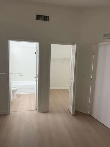 a view of small space with racks on the wall