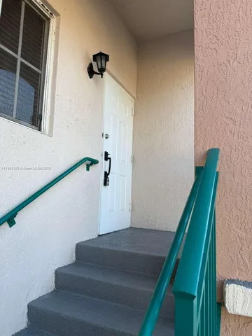 a view of entryway with stairs