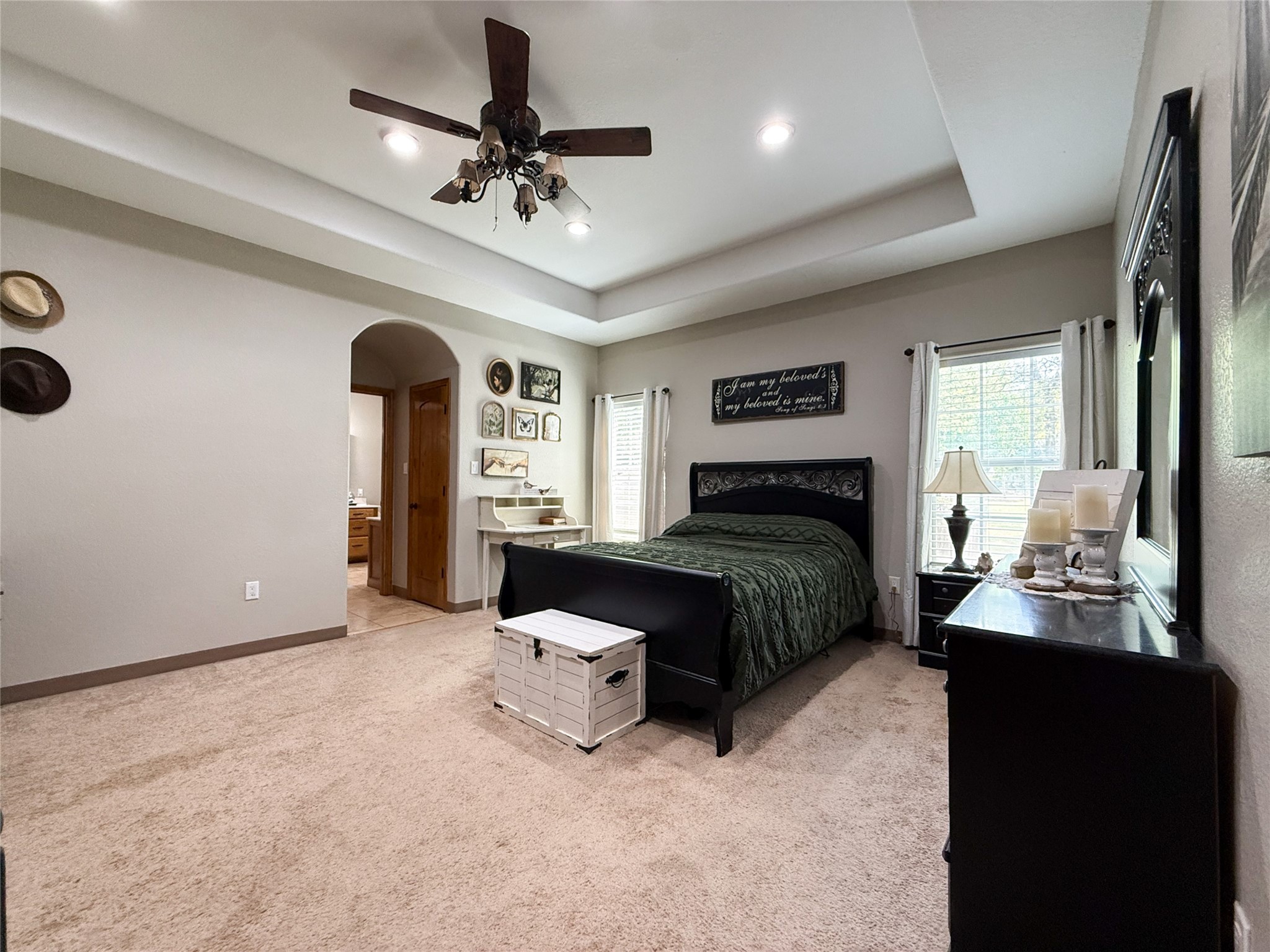 740 Bridget Avenue Buffalo, TX 75831 - Photo 30 of 50 a bedroom with a bed and a chandelier