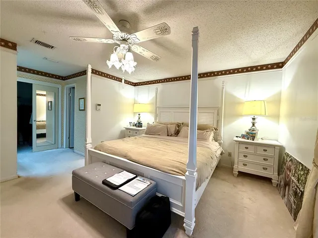 a bathroom with a toilet and a bathtub