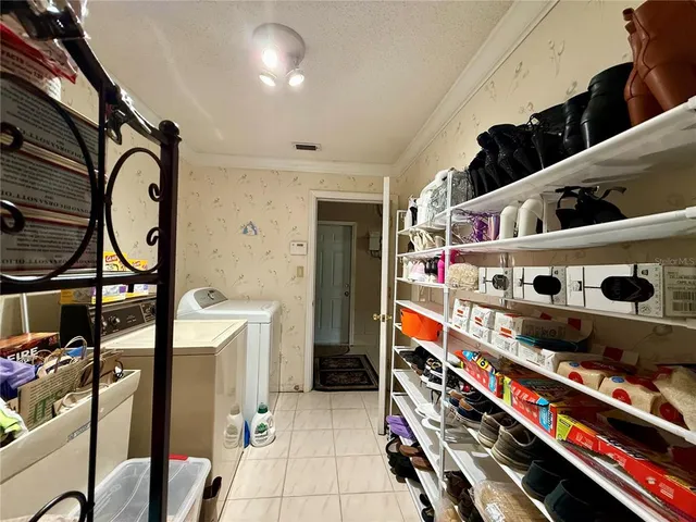 a view of a garage with cars