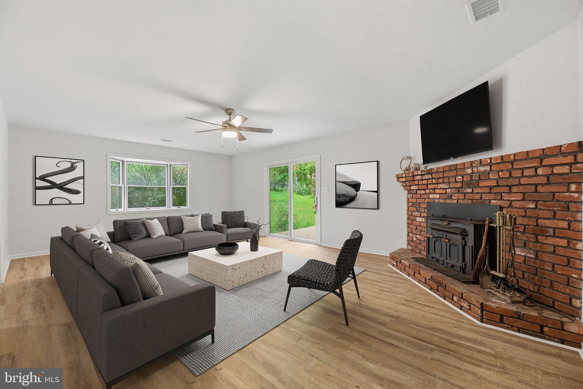 6664 Old Solomons Island Road Friendship, MD 20758 - Photo 2 of 39 Large family room lots of light!