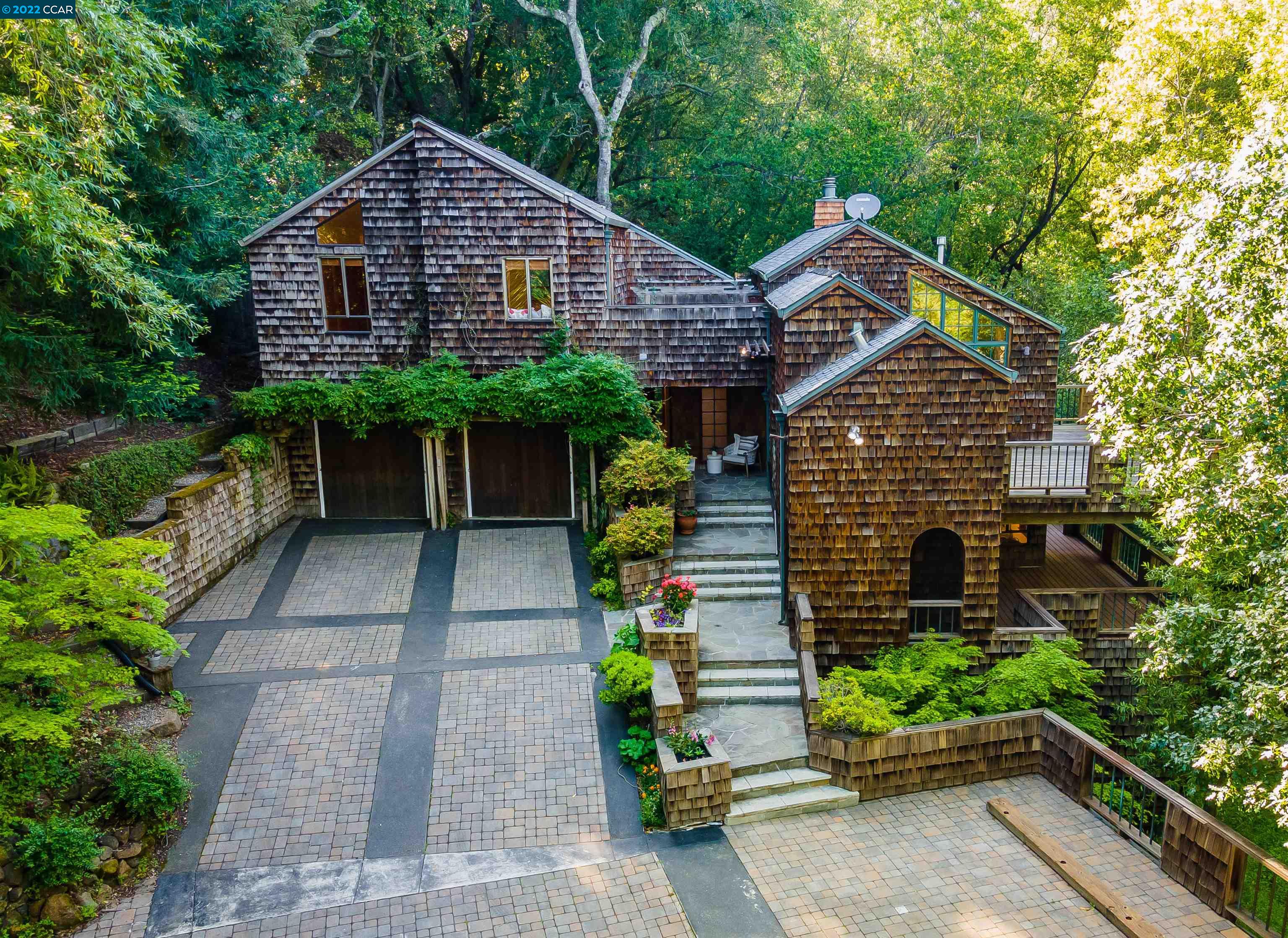 a house view with a garden space