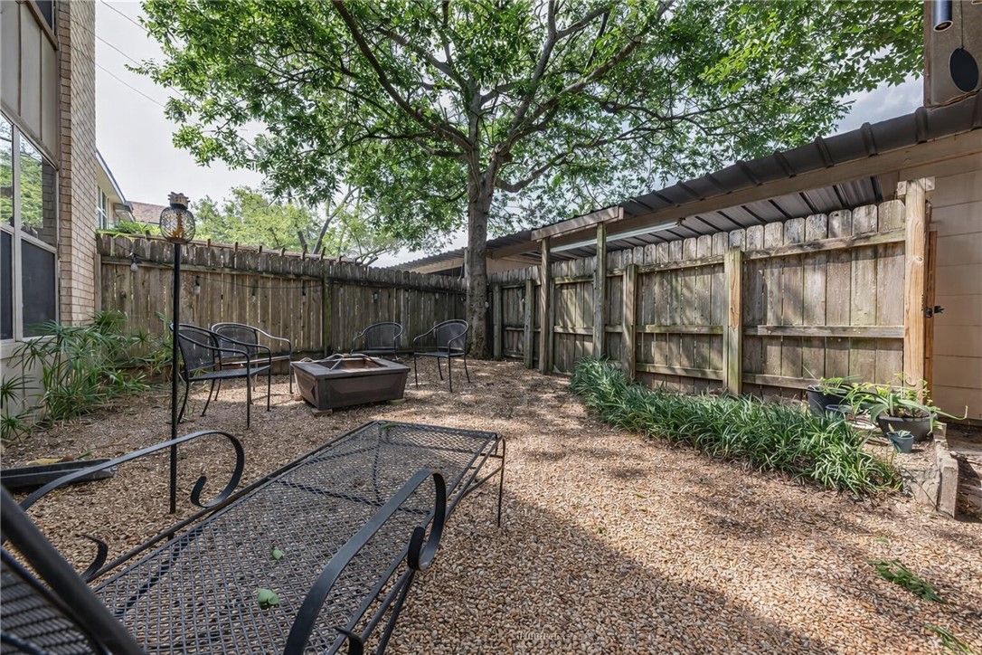 3820 Plainsman Lane Bryan, TX 77802 - Photo 20 of 20 a view of backyard with green space and seating space