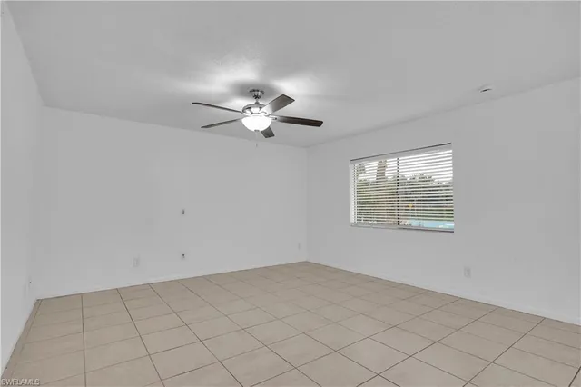 en view of an empty room with a window