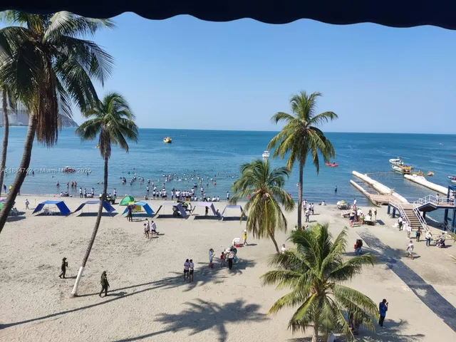 a view of outdoor space with palm trees