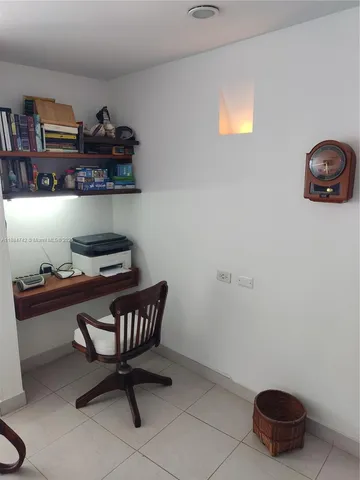 a table and chair in a room