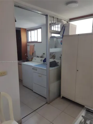a utility room with a washer and dryer
