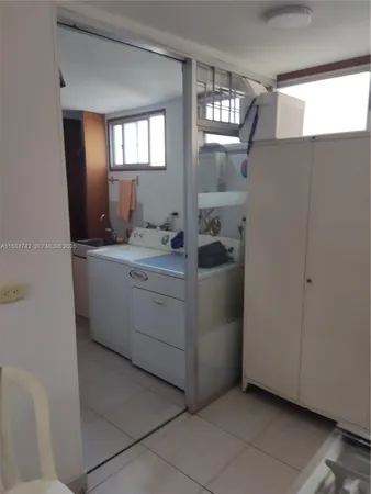 a utility room with a washer and dryer