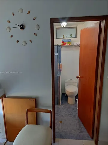 a view of bathroom with a toilet