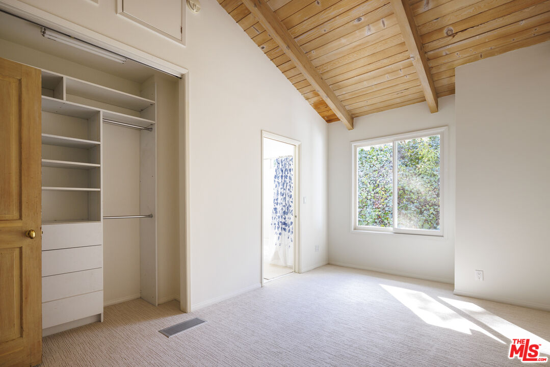 15946 Valley Wood Road Sherman Oaks, CA 91403 - Photo 17 of 23 a view of an empty room with a window