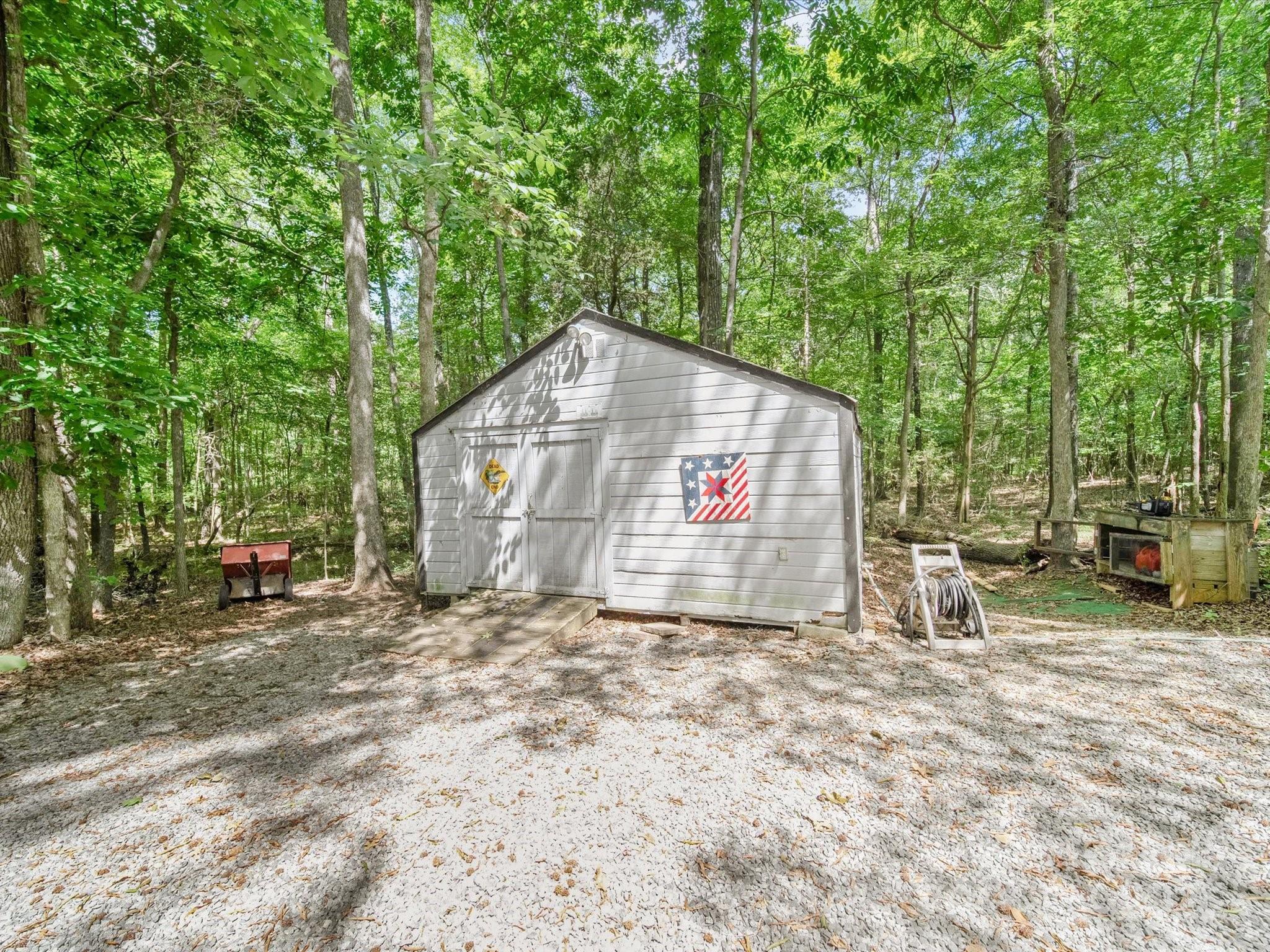 3911 Doster Road Monroe, NC 28112 - Photo 11 of 34 a view of a house with backyard and sitting area