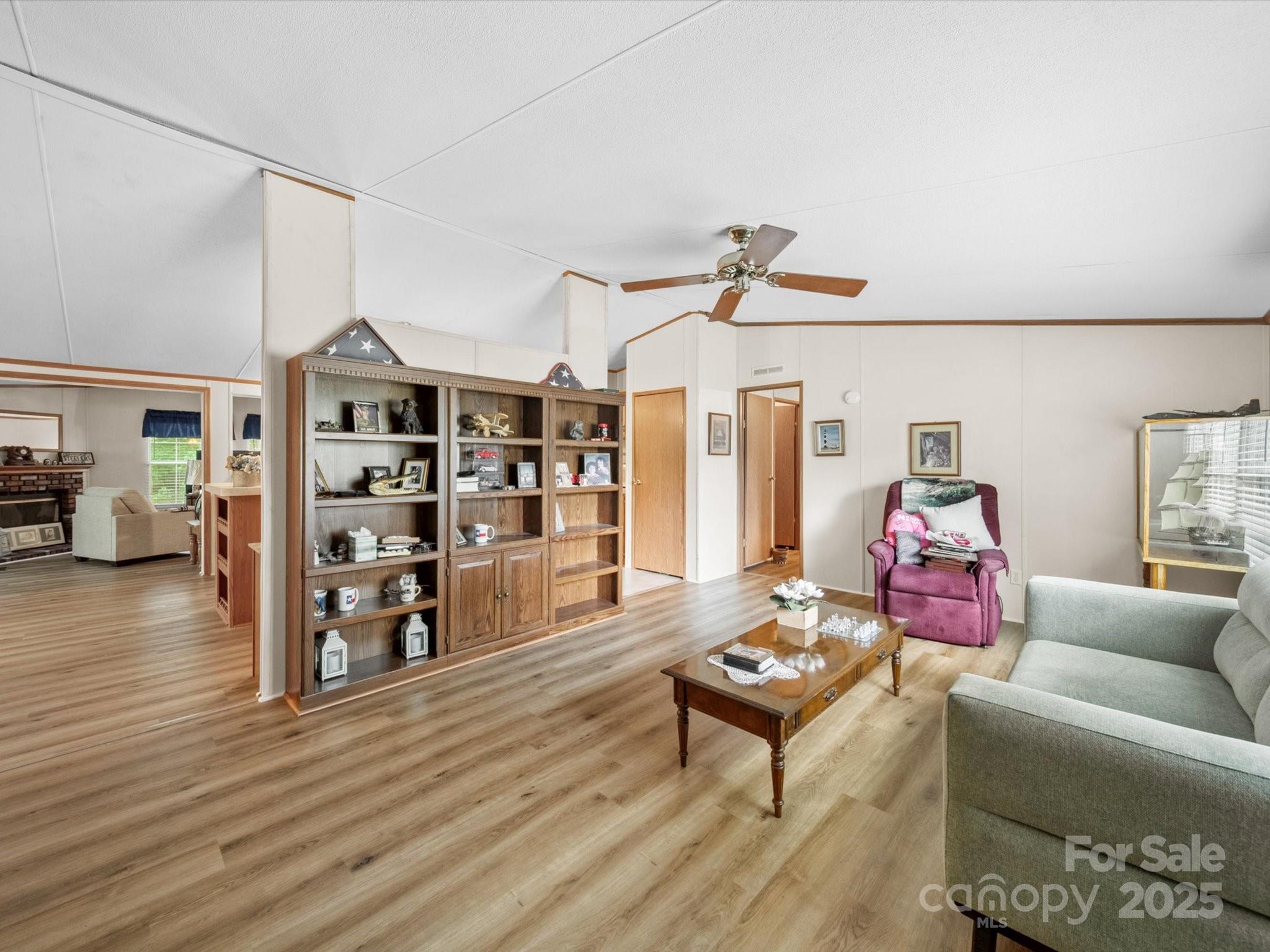 3911 Doster Road Monroe, NC 28112 - Photo 18 of 34 a living room with furniture and wooden floor