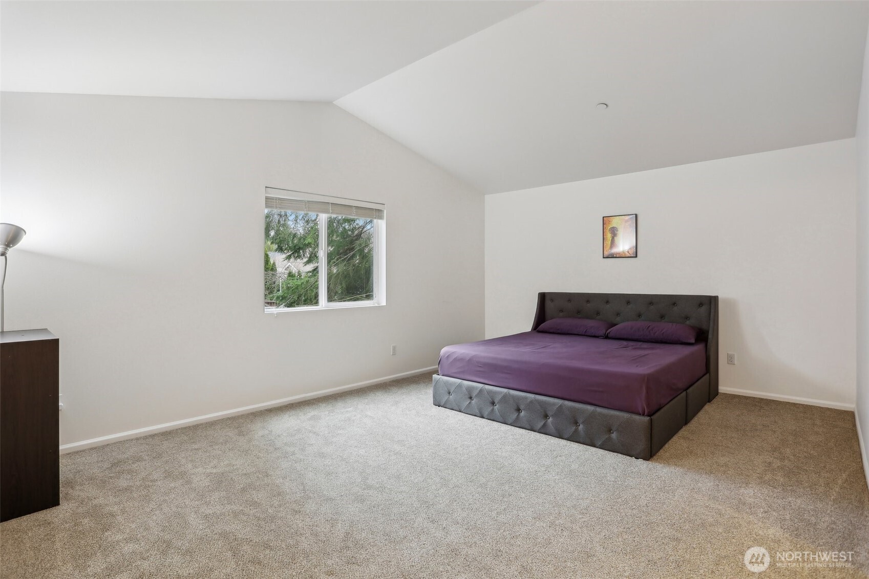 27 193rd Place Southwest, Unit 9 Bothell, WA 98012 - Photo 13 of 26 a spacious bedroom with a bed and a window