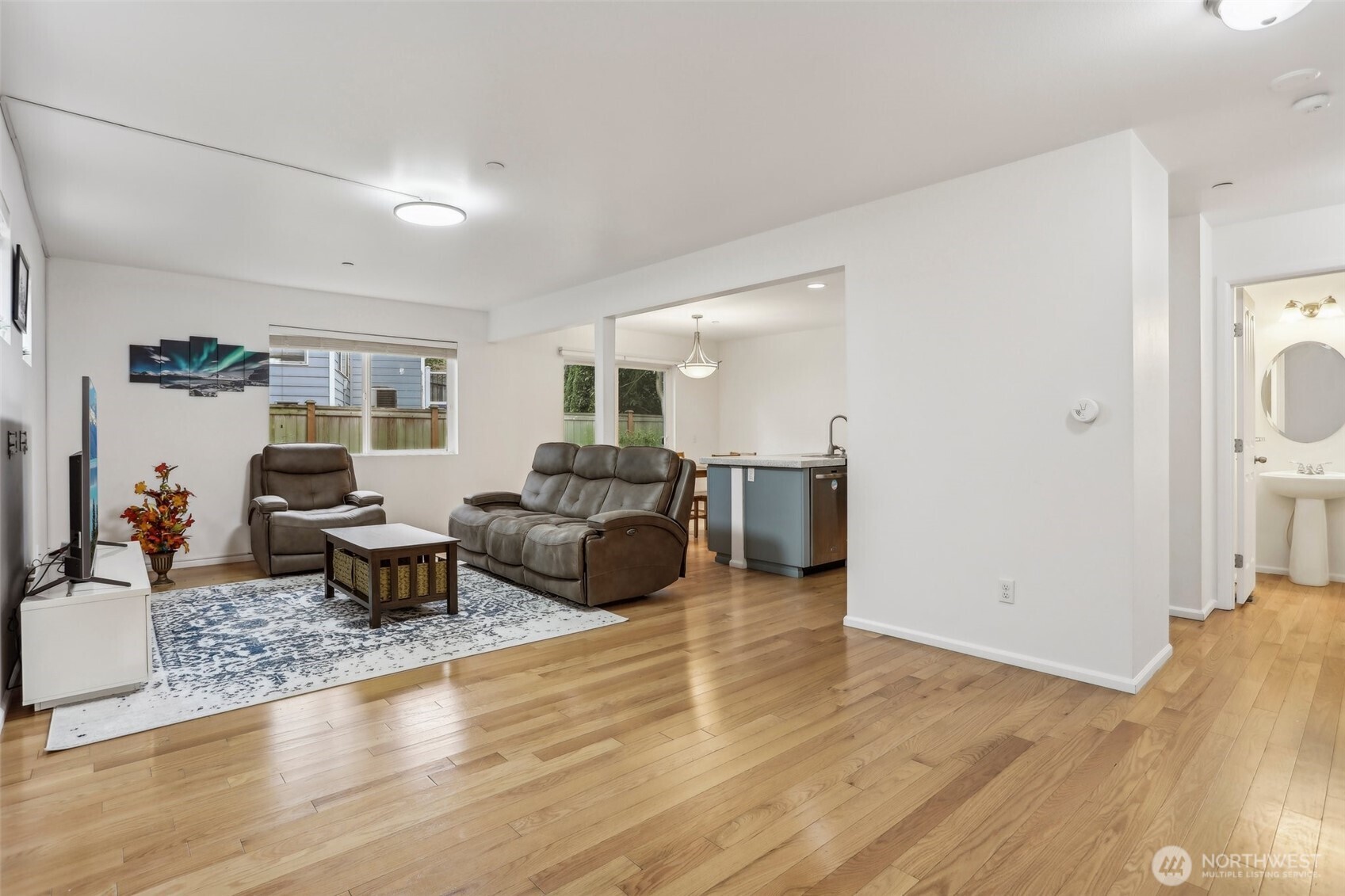 27 193rd Place Southwest, Unit 9 Bothell, WA 98012 - Photo 4 of 26 a living room with furniture window and wooden floor
