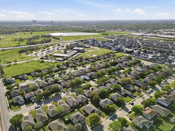 an aerial view of a city with lots of residential buildings