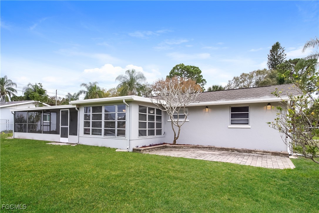 4215 Tarpon Road Venice, FL 34293 - Photo 16 of 16 a view of a house with backyard and porch