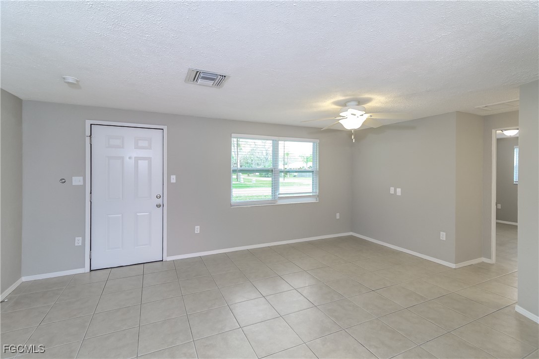 4215 Tarpon Road Venice, FL 34293 - Photo 3 of 16 a view of an empty room with a window