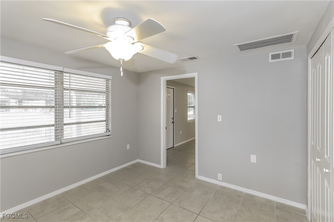 4215 Tarpon Road Venice, FL 34293 - Photo 9 of 16 a view of an empty room with a window