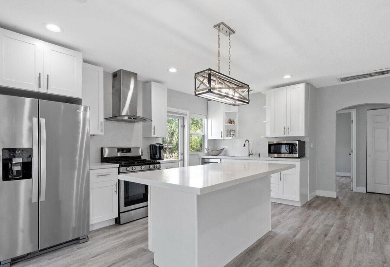 615 Southwest 9th Street Fort Lauderdale, FL 33315 - Photo 1 of 20 a kitchen with stainless steel appliances a sink stove and refrigerator
