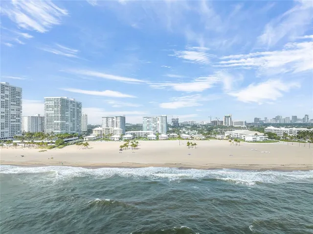 a view of a lake and city