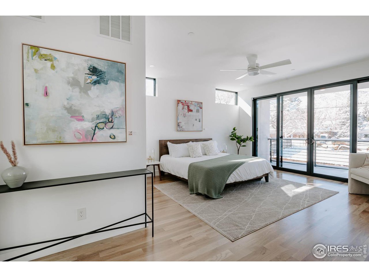 1175 Georgetown Road Boulder, CO 80305 - Photo 16 of 40 Generous upper level primary bedroom with mountain views, walk-in closet, and 5 piece ensuite bath.