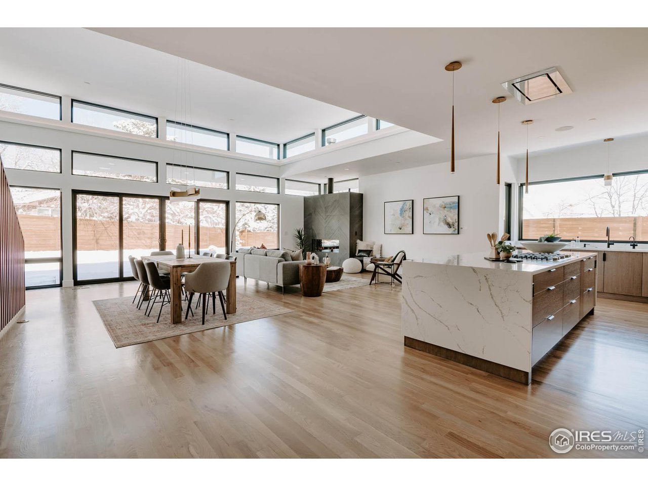 1175 Georgetown Road Boulder, CO 80305 - Photo 3 of 40 Spectacular main living area with more windows than walls and still very private. Large patio doors open to make easy entertaining, inviting the outside in. Main level has over 9' ceilings with 14' vaulted ceiling in living/dining area.