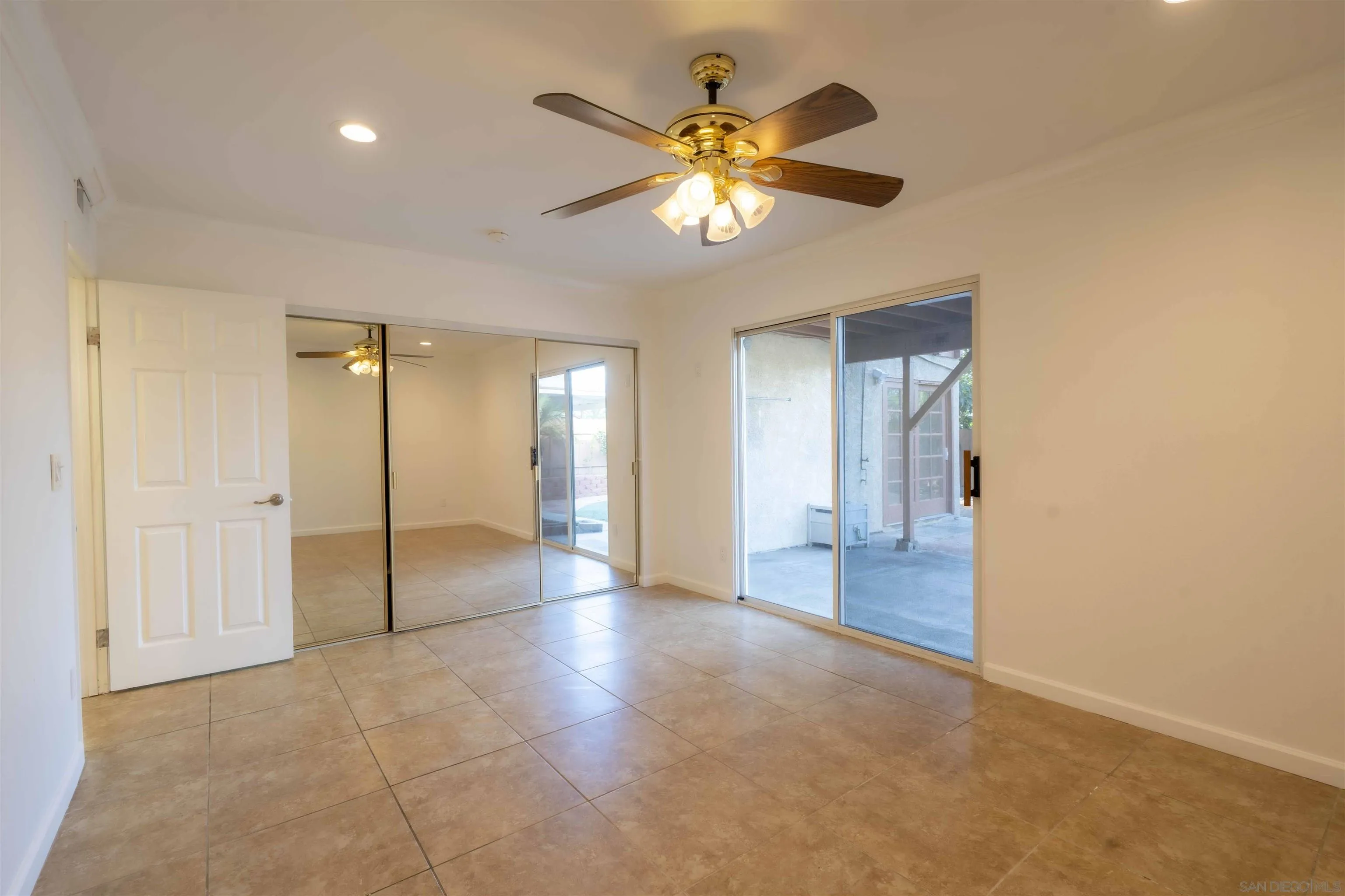 10858 Buggywhip Drive Spring Valley, CA 91978 - Photo 20 of 51 a view of an empty room and chandelier fan
