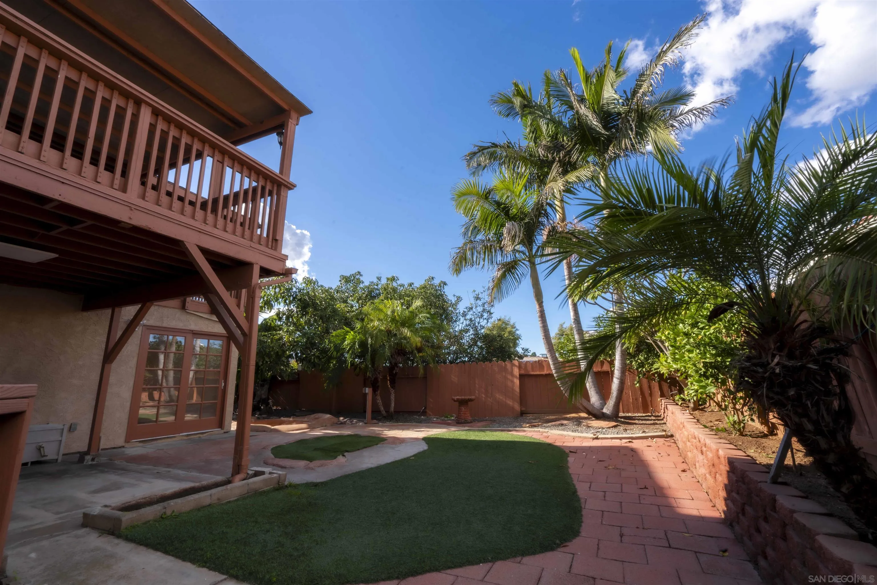 10858 Buggywhip Drive Spring Valley, CA 91978 - Photo 42 of 51 a front view of a house with a yard