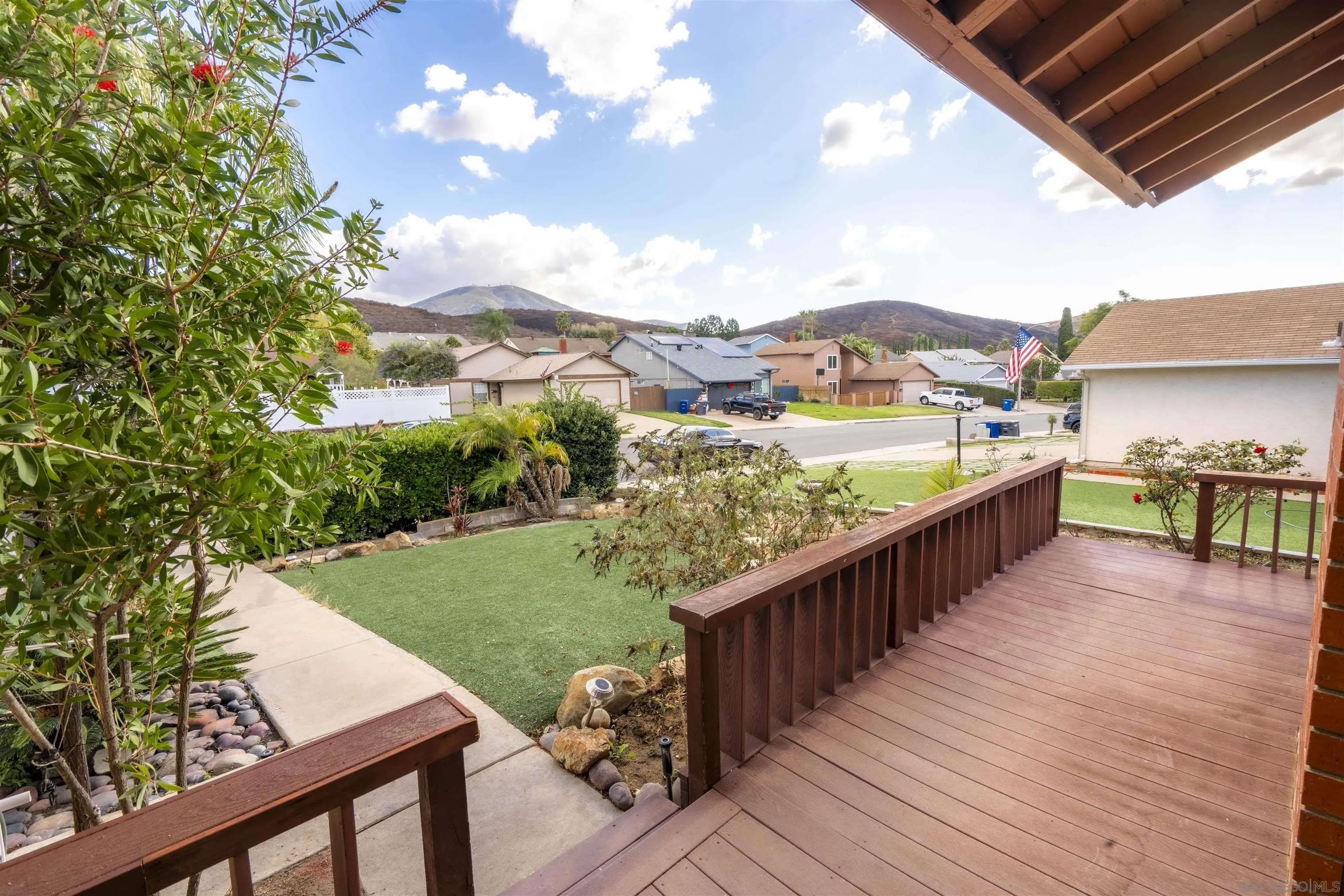 10858 Buggywhip Drive Spring Valley, CA 91978 - Photo 5 of 51 a view of a balcony with wooden floor and lake view