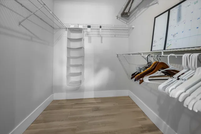 a view of a room with racks on the wall