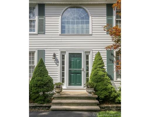 22 Garrison Road Dracut, MA 01826 - Photo 3 of 36 a front view of a house