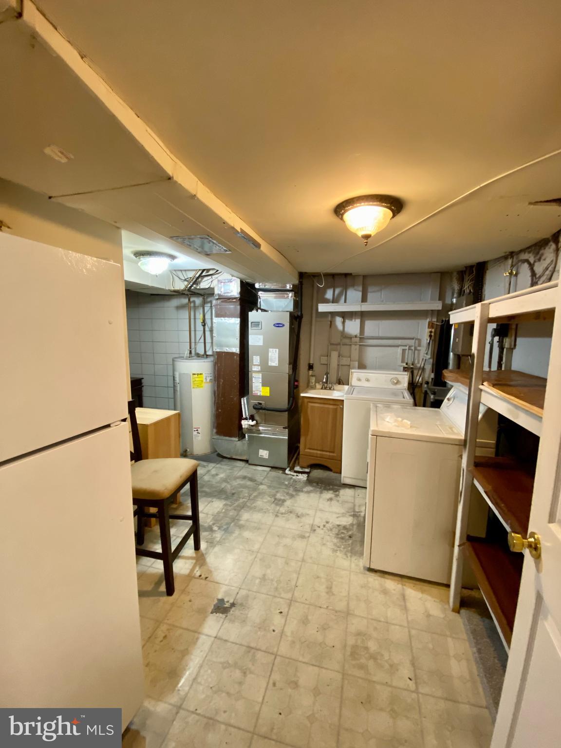 8852 Cork County Court Springfield, VA 22152 - Photo 24 of 31 a room with storage and utility