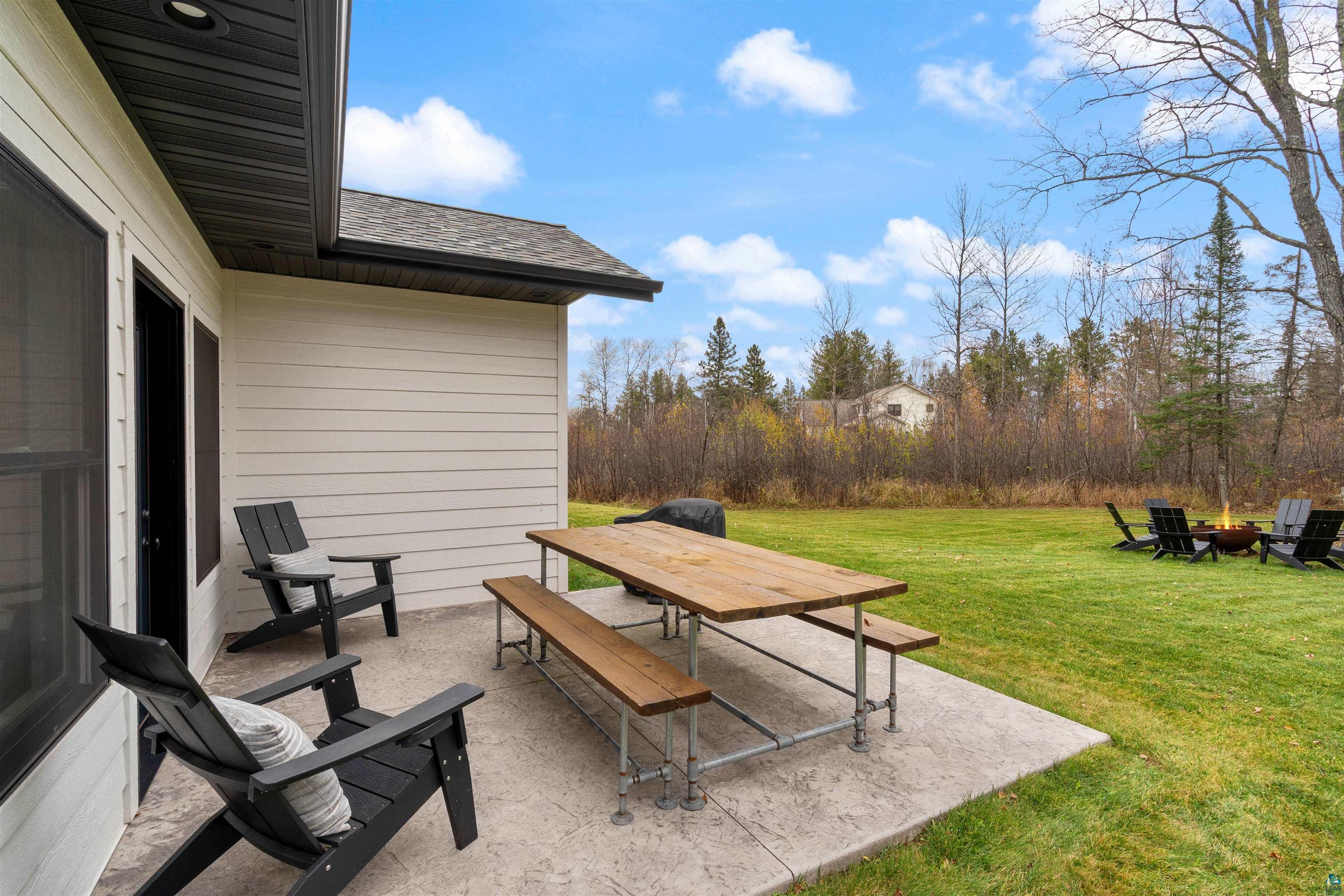 59 East Riverside Road Esko, MN 55733 - Photo 47 of 48 View of patio featuring outdoor dining space