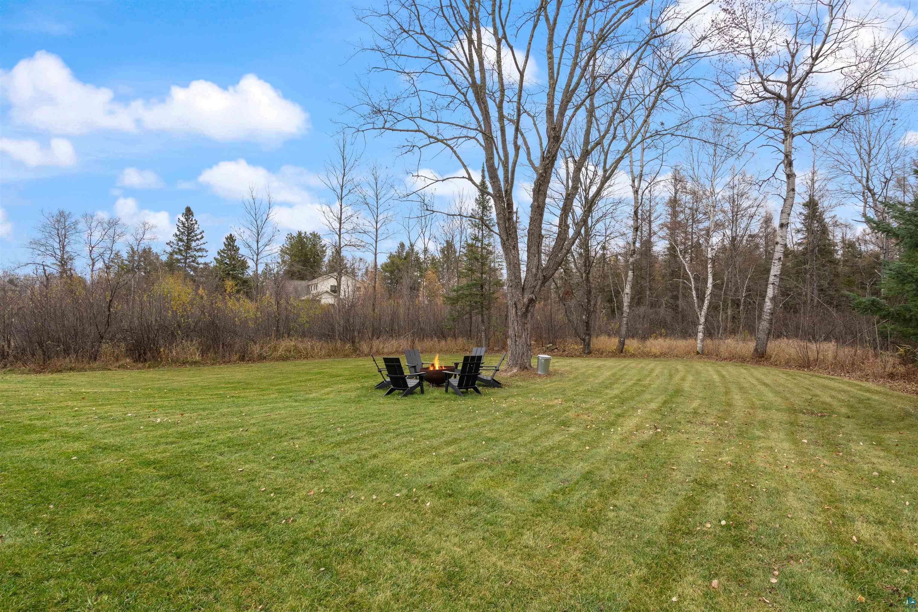 59 East Riverside Road Esko, MN 55733 - Photo 48 of 48 View of grassy yard