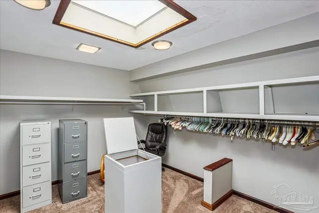 a aerial view of a house with a lake view