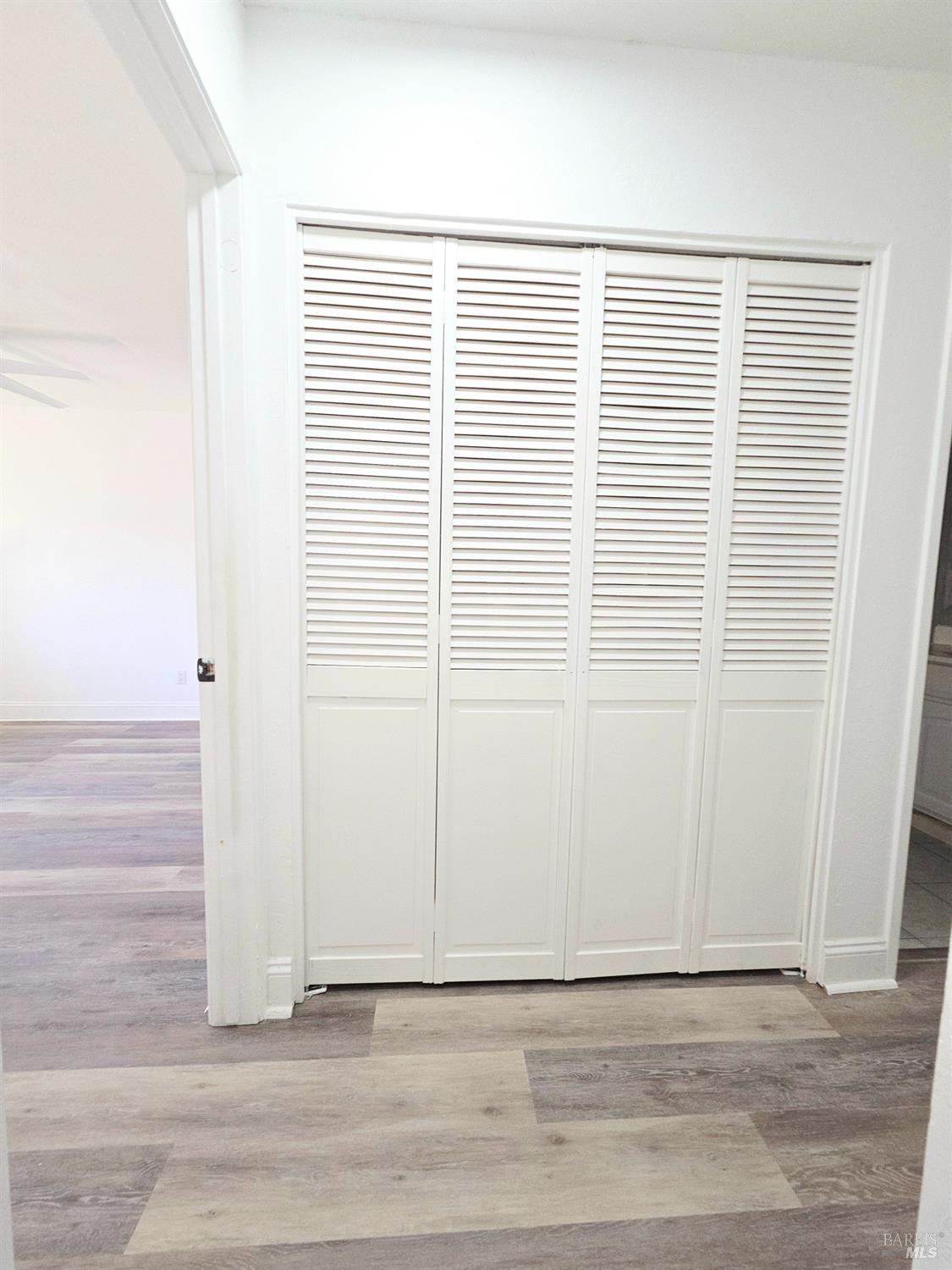 140 Del Rio Court, Unit 4 Vacaville, CA 95687 - Photo 20 of 25 a view of a small space with wooden floor