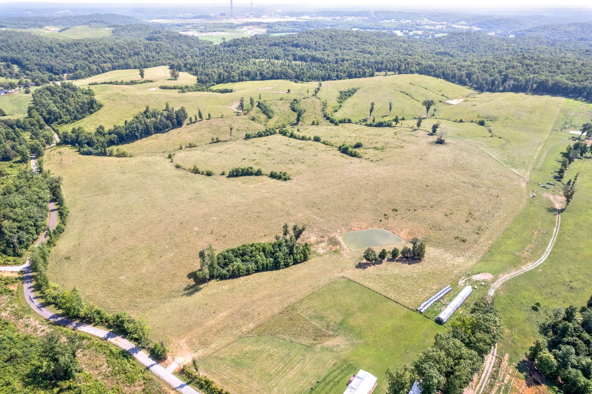 7 Brigham Branch Road Erin, TN 37061 - Photo 43 of 47 an aerial view of a swimming pool