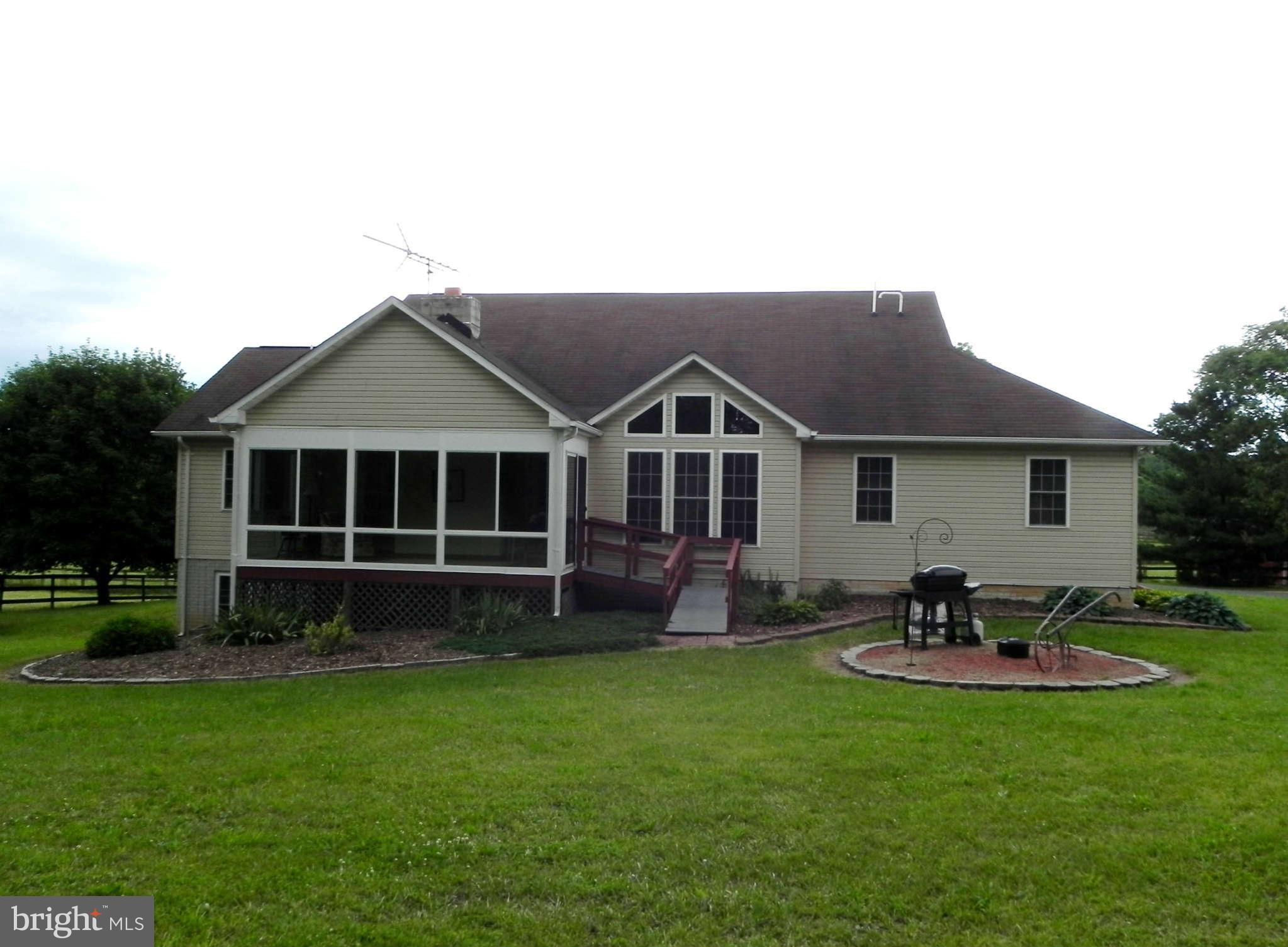 303 Stony Lane Ranson, WV 25438 - Photo 17 of 30 Exterior (Rear) w/ Sun Room