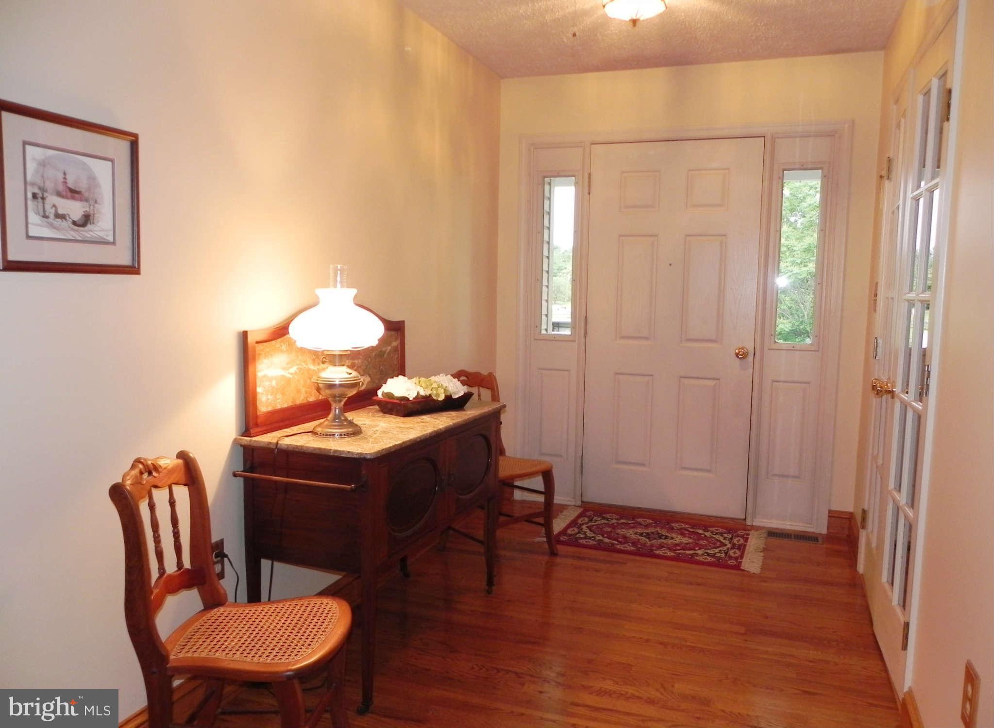 303 Stony Lane Ranson, WV 25438 - Photo 3 of 30 Foyer / Main Entrance w/ Hardwood Floor