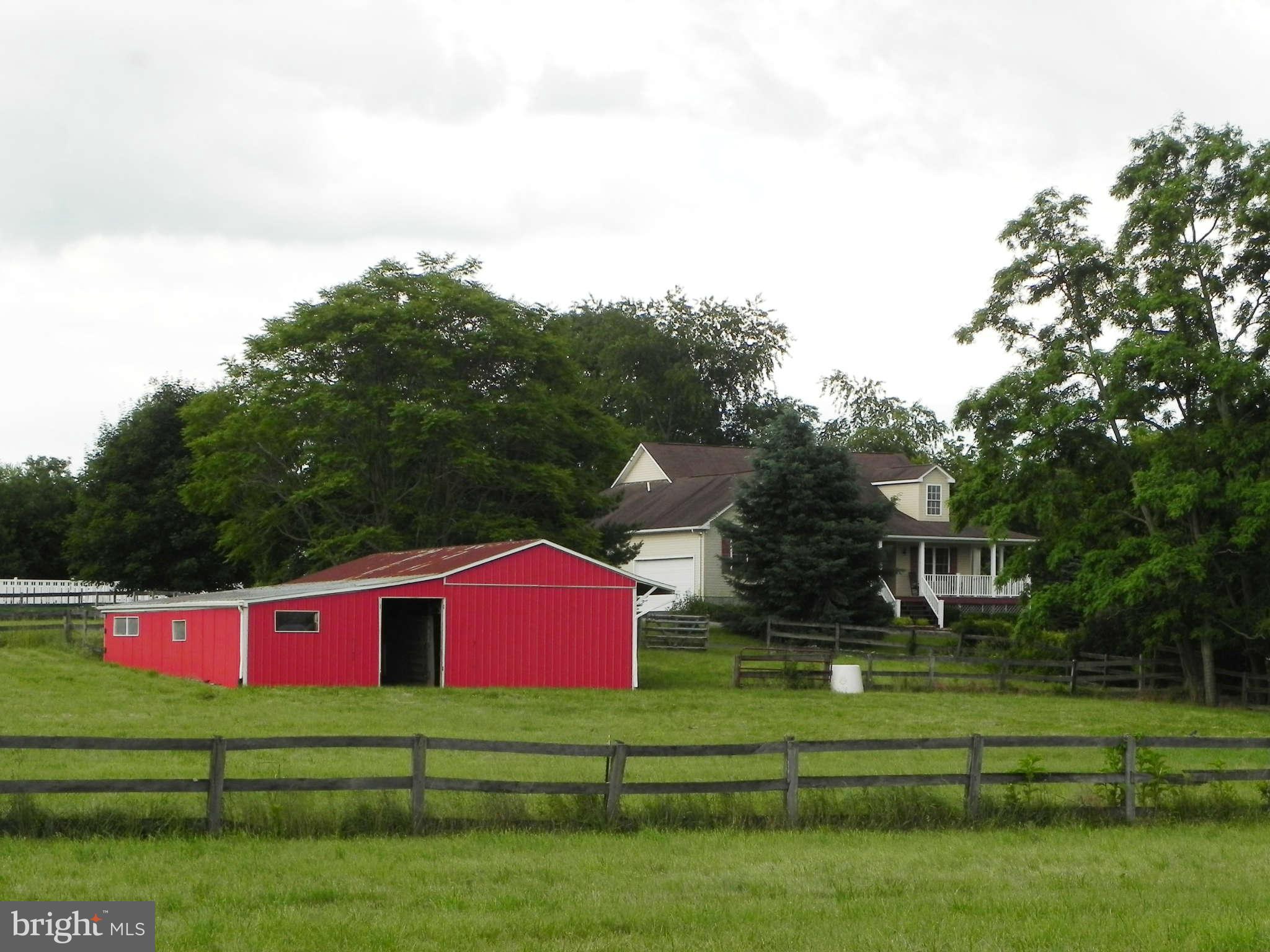 303 Stony Lane Ranson, WV 25438 - Photo 27 of 30 Horse Barn & Front of Rancher