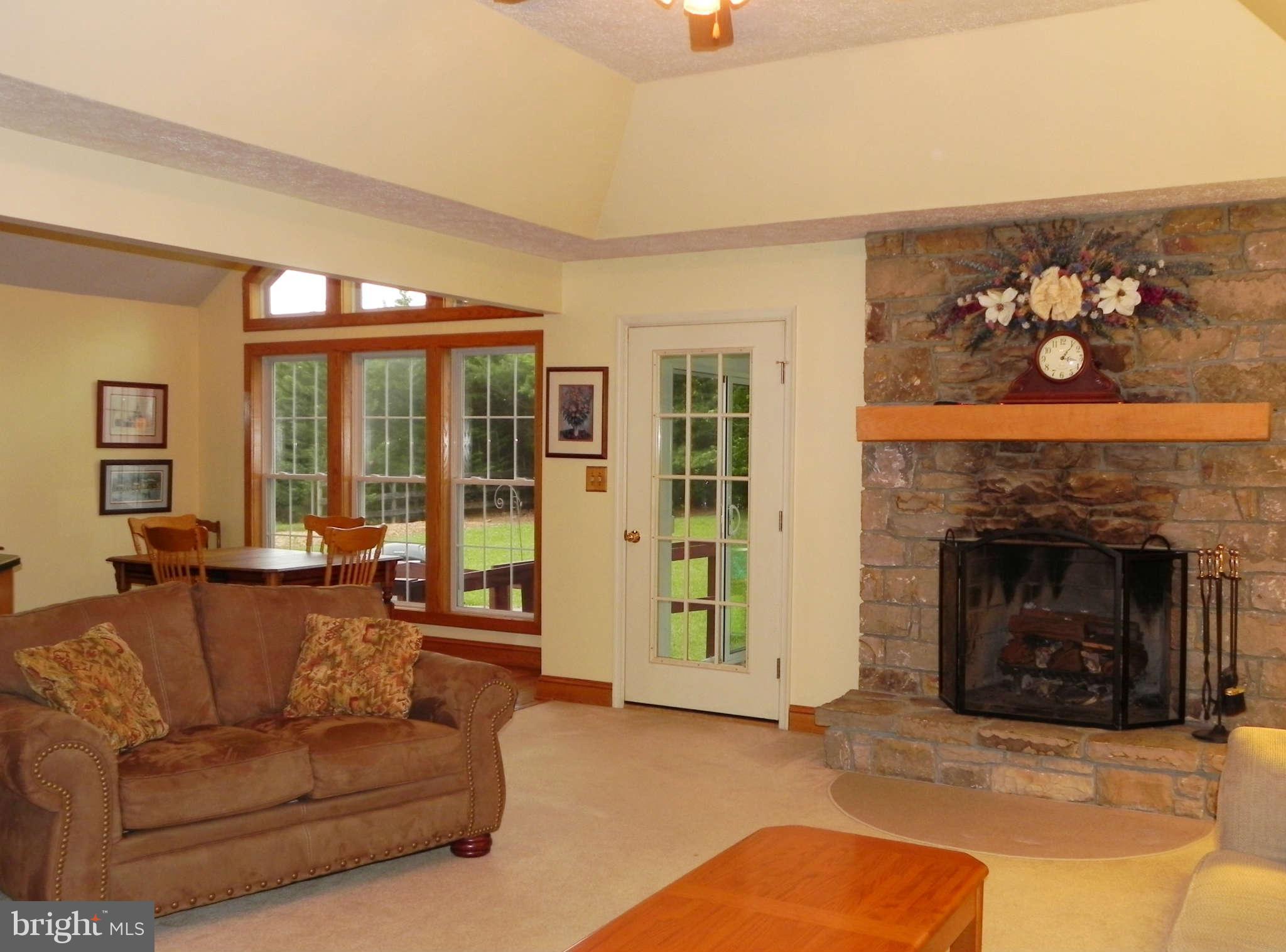 303 Stony Lane Ranson, WV 25438 - Photo 5 of 30 Family Room w/ Stone Fireplace